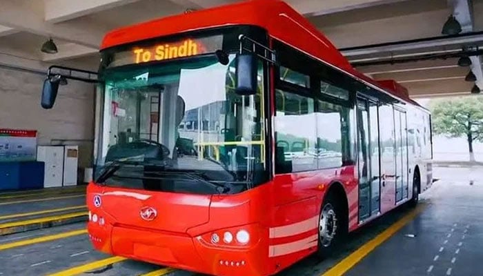 A bus from Peoples Bus Service stands parked at its terminal in Karachi. — X/pbsbrtsindh